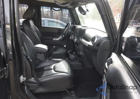 2014 Jeep Wrangler Unlimited Sahara z USA, uszkodzony, nr VIN 1C4HJWEG5EL214562